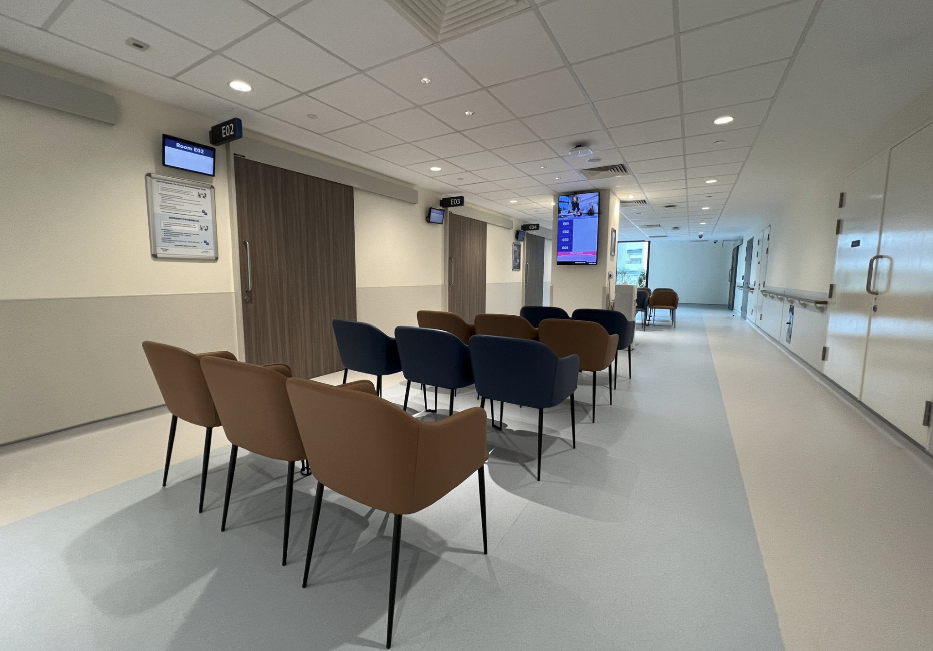 Woodlands Hospital waiting area with seating and consultation rooms